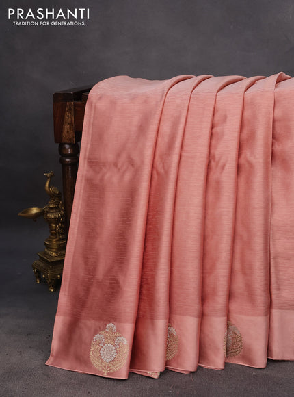 Mushru silk saree peach shade with allover self emboss and zari woven butta border