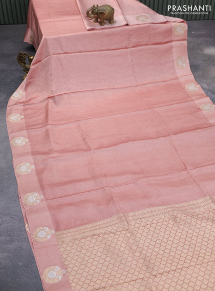 Mushru silk saree peach shade with allover self emboss and zari woven butta border