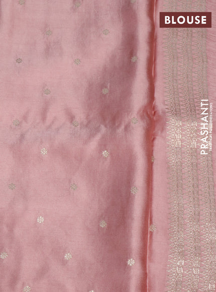 Mushru silk saree peach shade with allover self emboss and zari woven butta border