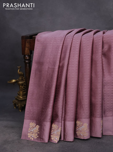 Mushru silk saree pastel purple with allover self emboss and zari woven butta border