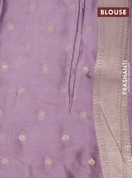 Mushru silk saree pastel purple with allover self emboss and zari woven butta border