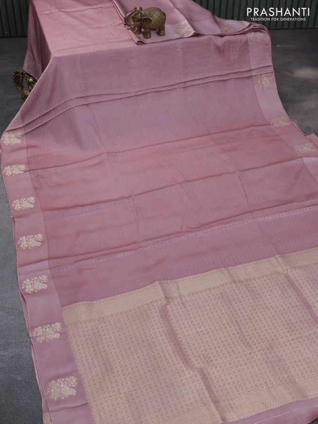 Mushru silk saree  rosy brown with allover self emboss and zari woven butta border