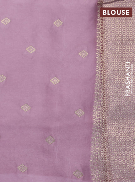 Mushru silk saree  rosy brown with allover self emboss and zari woven butta border