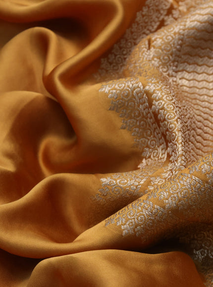 Mushru silk saree mustard yellow with zari woven buttas and zari woven butta border