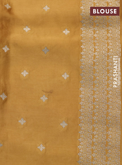 Mushru silk saree mustard yellow with zari woven buttas and zari woven butta border