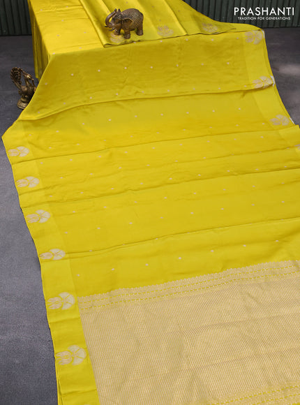 Mushru silk saree lime yellow with zari woven buttas and zari woven butta border