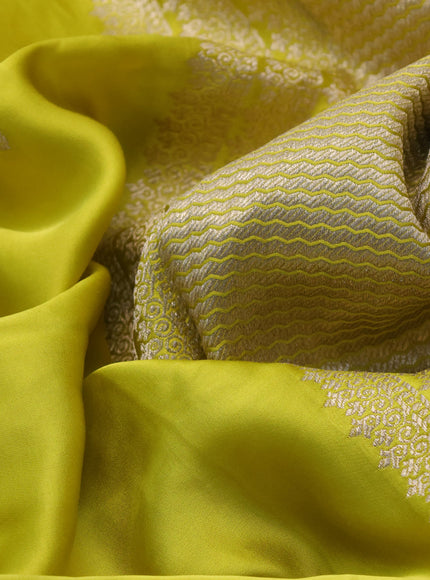 Mushru silk saree lime yellow with zari woven buttas and zari woven butta border