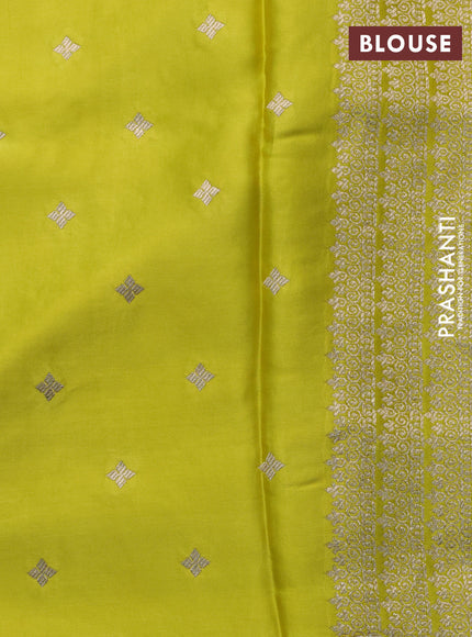 Mushru silk saree lime yellow with zari woven buttas and zari woven butta border