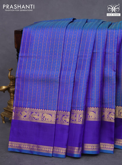 Pure kanchipuram silk saree cs blue and blue with allover thread checks & buttas and rettapet zari woven border