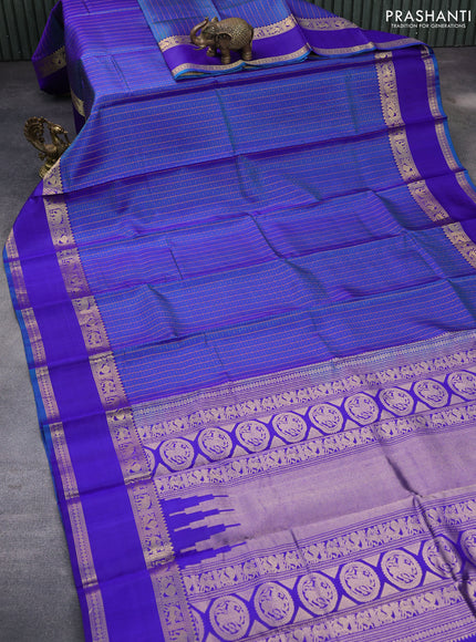 Pure kanchipuram silk saree cs blue and blue with allover thread checks & buttas and rettapet zari woven border