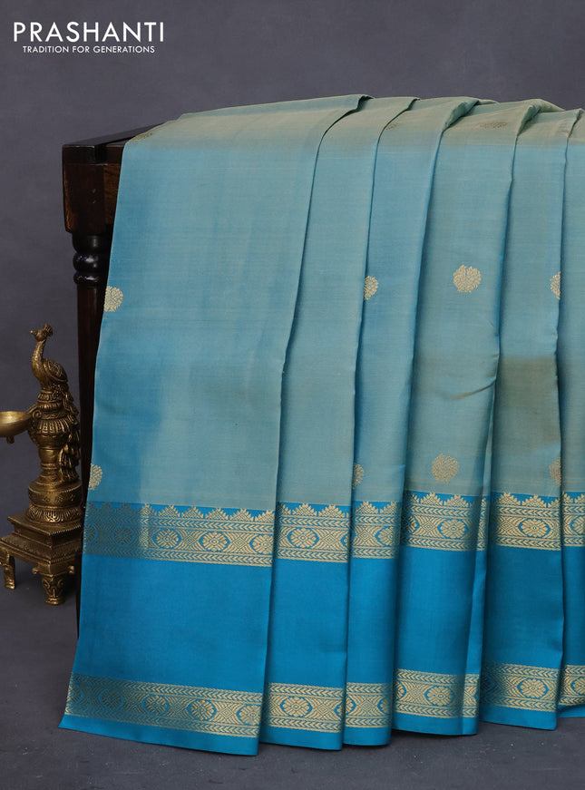 Pure kanchipuram silk saree teal blue shade and cs blue with zari woven buttas and rettapet zari woven border