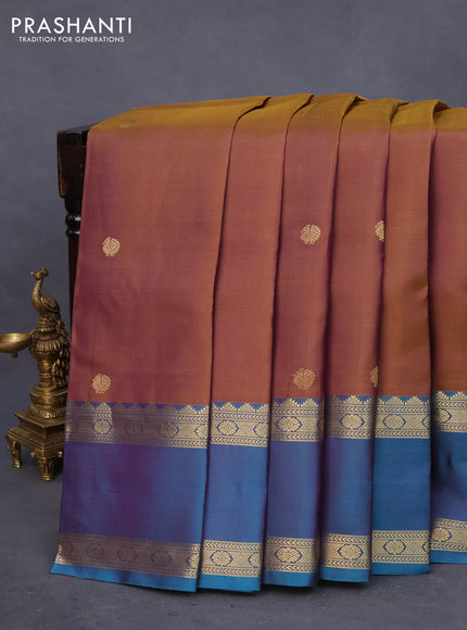 Pure kanchipuram silk saree dual shade of honey and peacock green with zari woven buttas and rettapet zari woven border