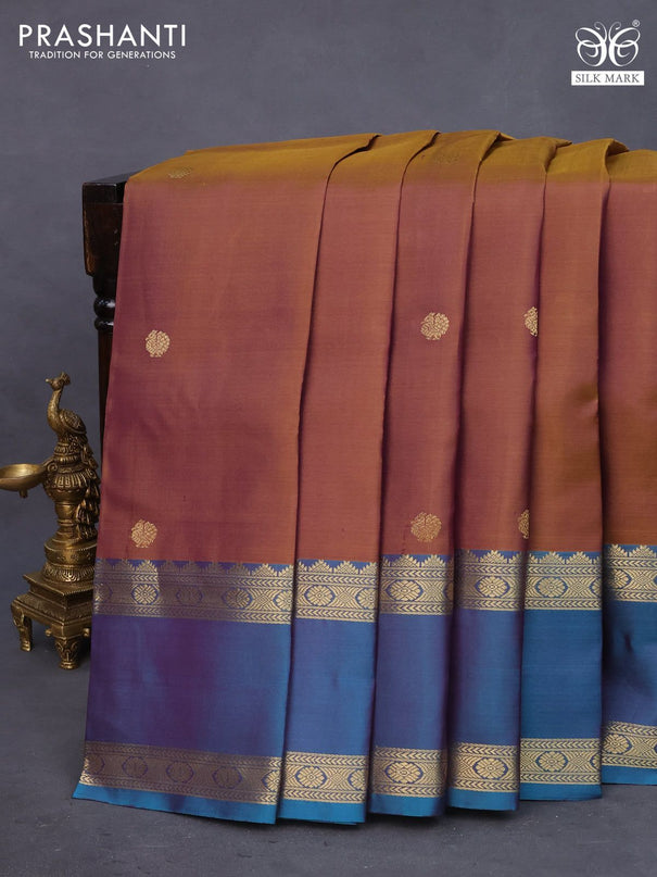 Pure kanchipuram silk saree dual shade of honey and peacock green with zari woven buttas and rettapet zari woven border