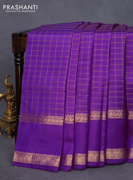 Pure kanchipuram silk saree purple with allover zari checked pattern and rettapet zari woven border