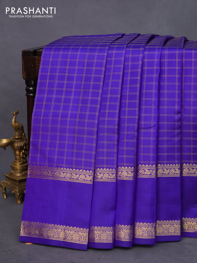 Pure kanchipuram silk saree blue with allover zari checked pattern and rettapet zari woven border