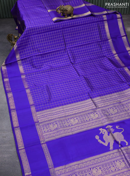 Pure kanchipuram silk saree blue with allover zari checked pattern and rettapet zari woven border