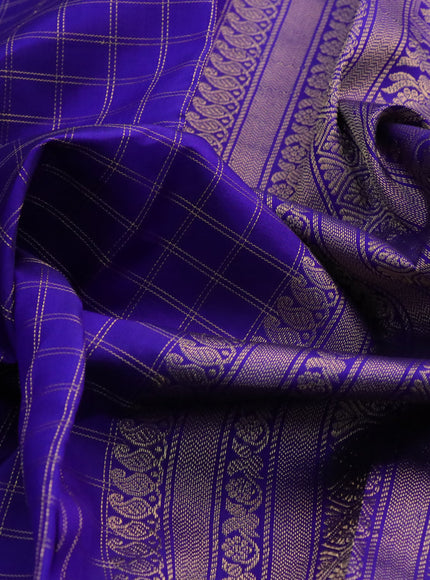 Pure kanchipuram silk saree blue with allover zari checked pattern and rettapet zari woven border