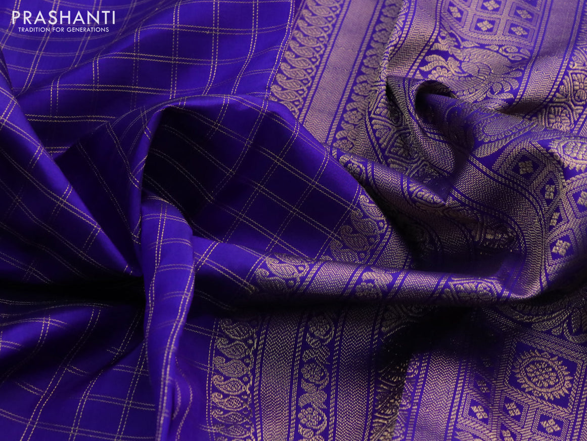 Pure kanchipuram silk saree blue with allover zari checked pattern and rettapet zari woven border