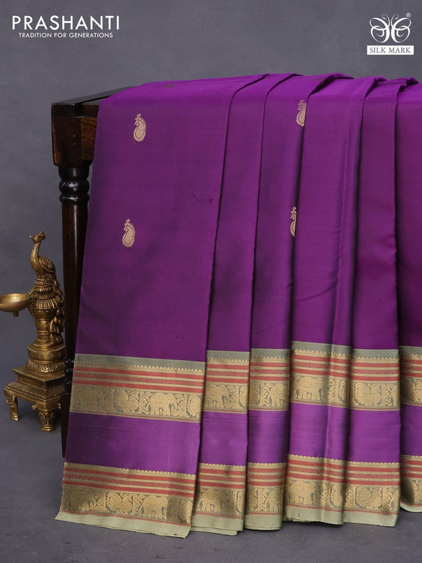 Pure kanchipuram silk saree deep purple and elaichi green with paisley zari woven buttas and rettapet zari woven border