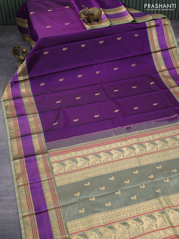 Pure kanchipuram silk saree deep purple and elaichi green with paisley zari woven buttas and rettapet zari woven border