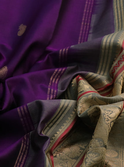 Pure kanchipuram silk saree deep purple and elaichi green with paisley zari woven buttas and rettapet zari woven border