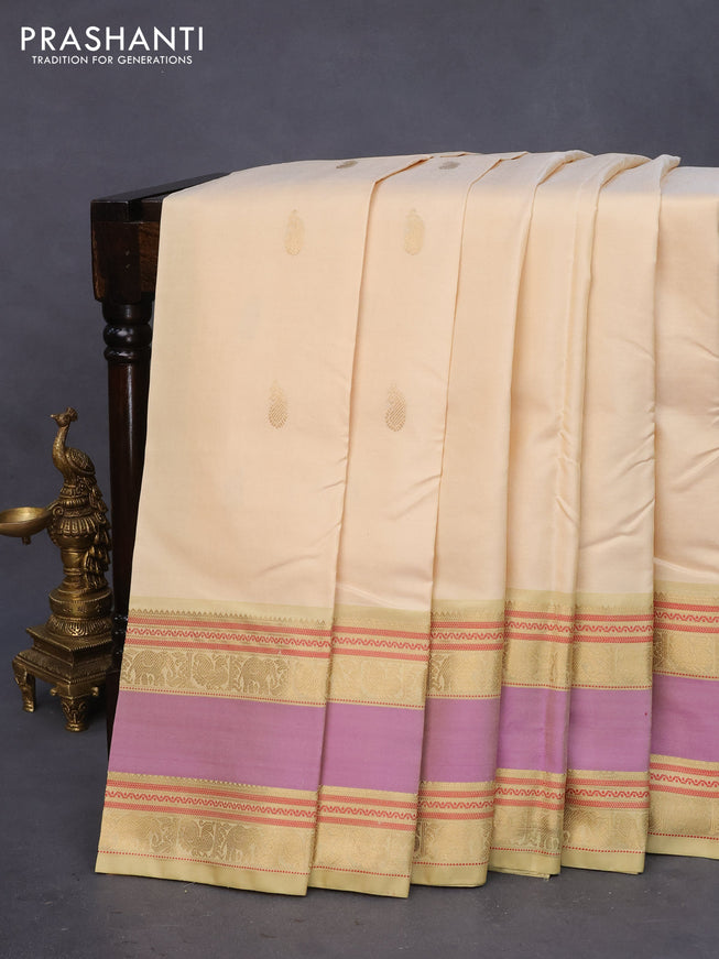 Pure kanchipuram silk saree sandal with paisley zari woven buttas and rettapet zari woven border