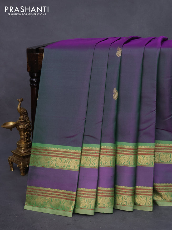 Pure kanchipuram silk saree dual shade of greenish purple and pastel green with paisley zari woven buttas and rettapet zari woven border