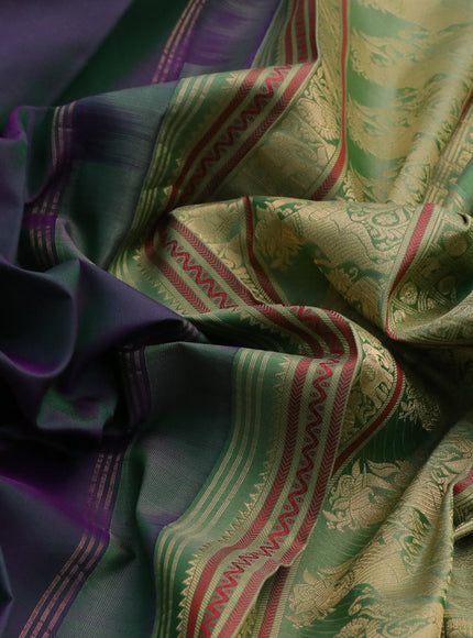 Pure kanchipuram silk saree dual shade of greenish purple and pastel green with paisley zari woven buttas and rettapet zari woven border