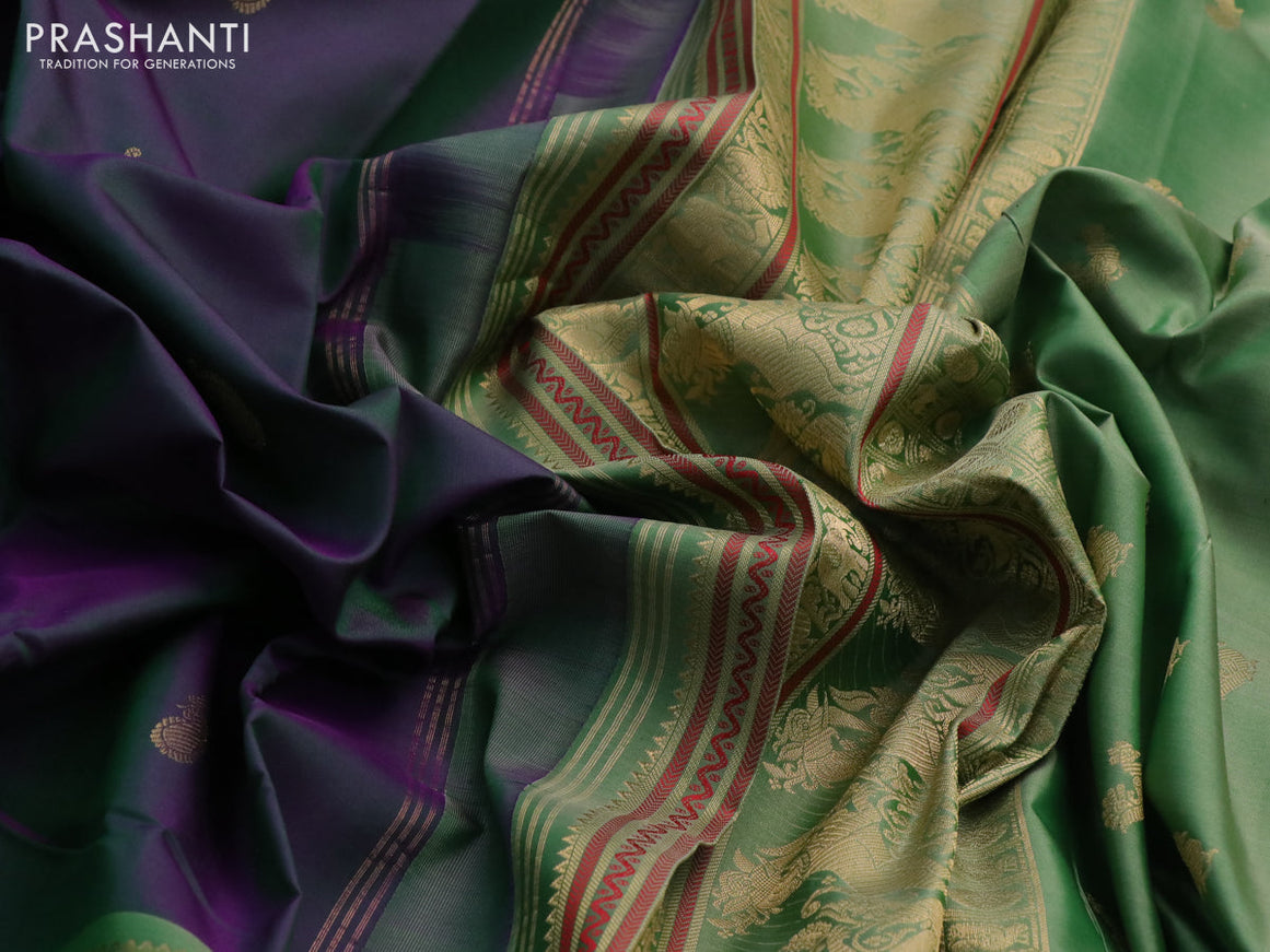 Pure kanchipuram silk saree dual shade of greenish purple and pastel green with paisley zari woven buttas and rettapet zari woven border