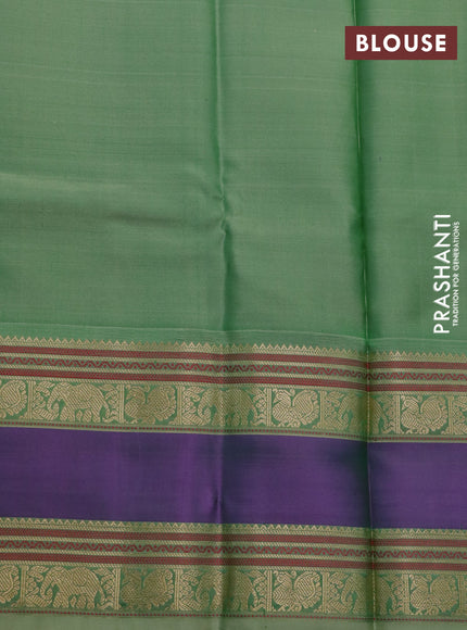 Pure kanchipuram silk saree dual shade of greenish purple and pastel green with paisley zari woven buttas and rettapet zari woven border