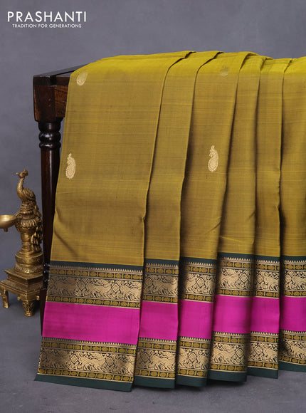 Pure kanchipuram silk saree mehendi green and bottle green with paisley zari woven buttas and rettapet zari woven border