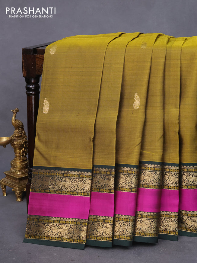 Pure kanchipuram silk saree mehendi green and bottle green with paisley zari woven buttas and rettapet zari woven border