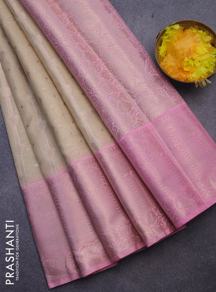 Cotton zari kota saree sandal and light pink with allover zari weaves and long zari woven border