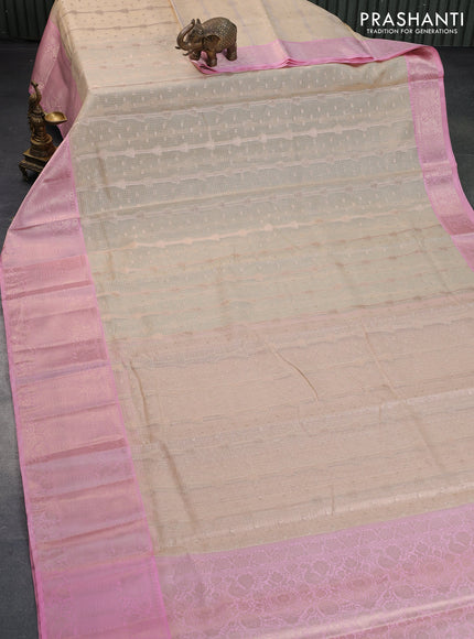 Cotton zari kota saree sandal and light pink with allover zari weaves and long zari woven border