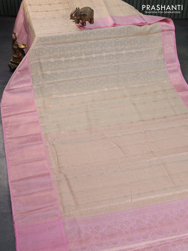 Cotton zari kota saree sandal and light pink with allover zari weaves and long zari woven border