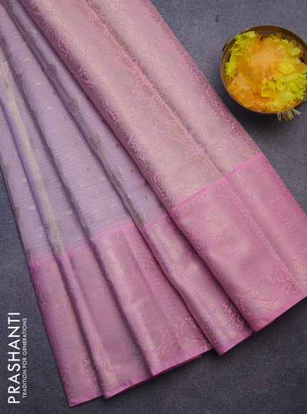 Cotton zari kota saree pastel lavender and light pink with allover zari weaves and long zari woven border