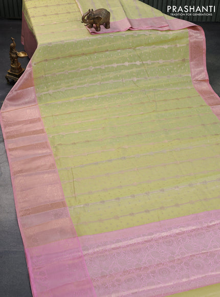 Cotton zari kota saree light green and peach pink with allover zari weaves and long zari woven border