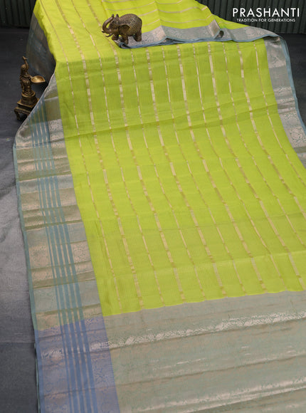 Cotton zari kota saree fluorescent green and dual shade of grey with allover zari woven stripes pattern and long zari woven border