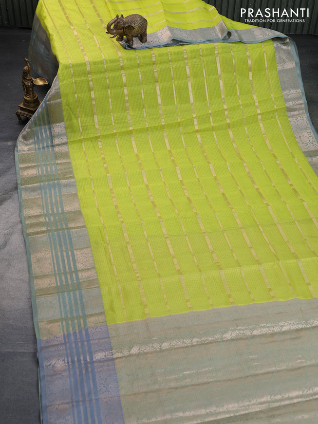 Cotton zari kota saree fluorescent green and dual shade of grey with allover zari woven stripes pattern and long zari woven border