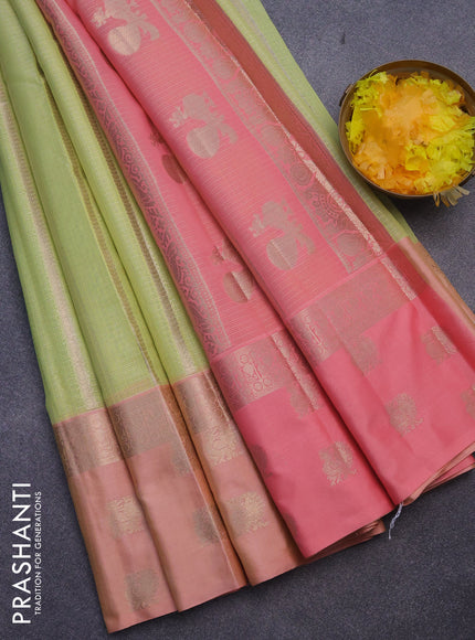 Cotton zari kota saree pista green and peach pink with allover zari weaves and zari woven butta border