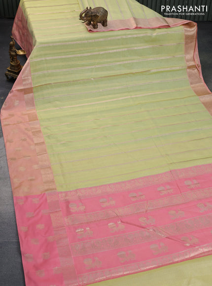 Cotton zari kota saree pista green and peach pink with allover zari weaves and zari woven butta border