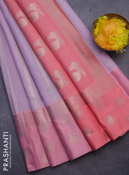 Cotton zari kota saree pastel lavender and peach pink with allover zari weaves and zari woven butta border