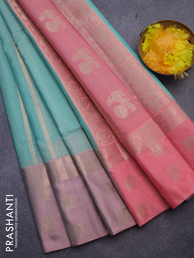 Cotton zari kota saree teal green and peach pink with allover zari weaves and zari woven butta border