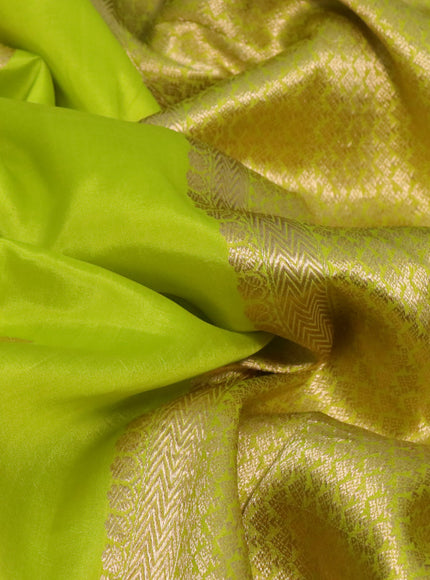 Pure banarasi katan silk saree fluorescent green with zari woven floral buttas and zari woven border