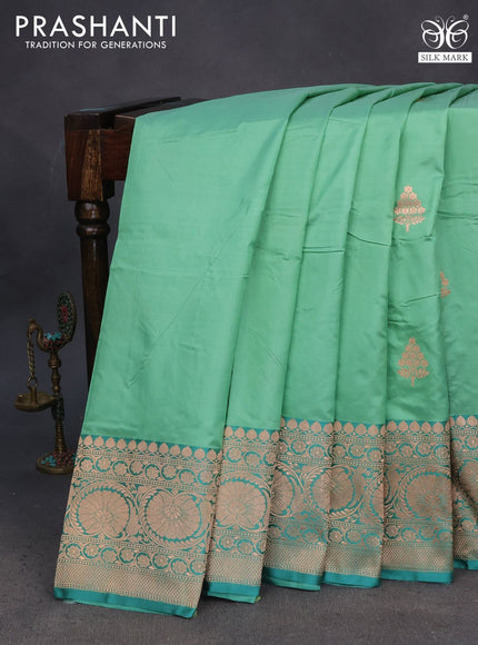 Pure banarasi katan silk saree pastel green and teal green shade with zari woven buttas and copper zari woven border