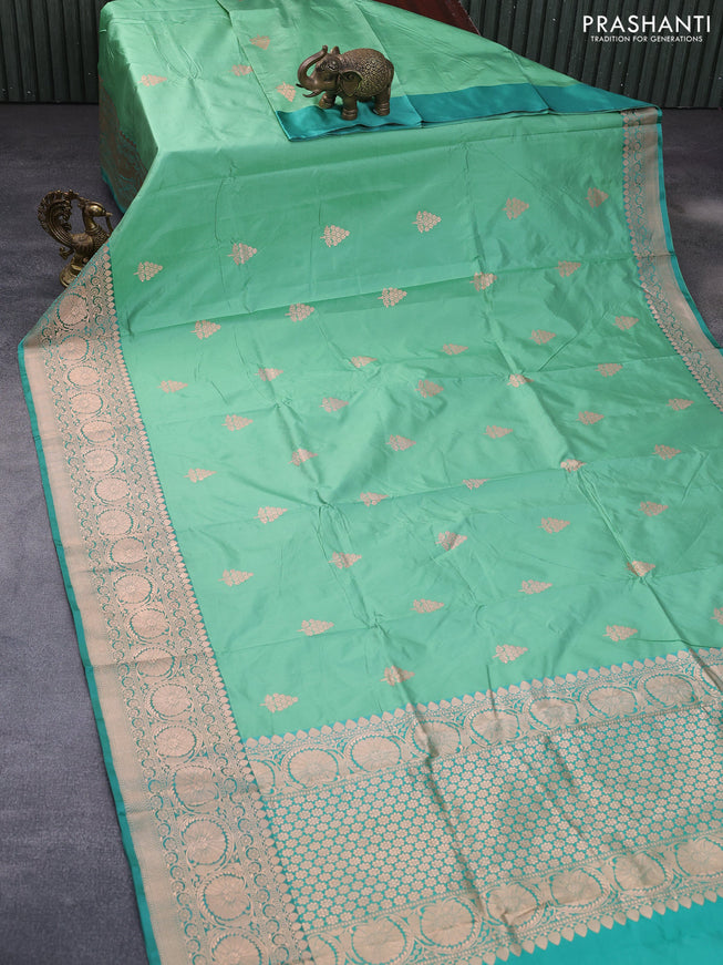 Pure banarasi katan silk saree pastel green and teal green shade with zari woven buttas and copper zari woven border