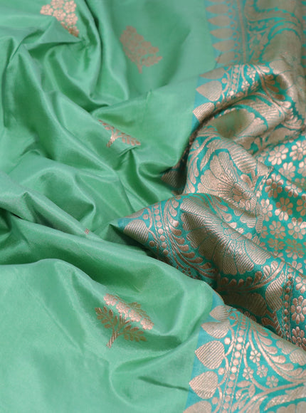 Pure banarasi katan silk saree pastel green and teal green shade with zari woven buttas and copper zari woven border