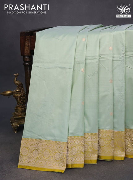 Pure banarasi katan silk saree pastel green and yellow with zari woven floral buttas and zari woven floral border