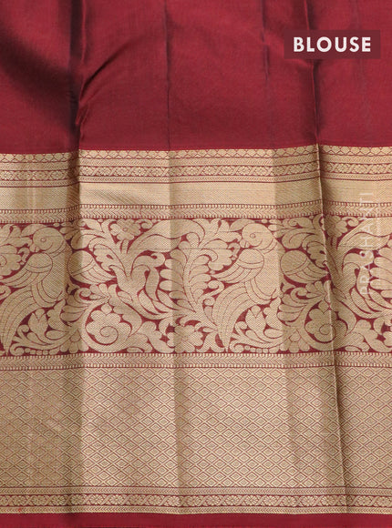 Kanchipuram silk saree teal green and maroon with allover zari woven brocade weaves and long zari woven border