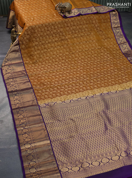 Kanchipuram silk saree dark mustard and deep violet with allover zari woven brocade weaves and long annam zari woven border